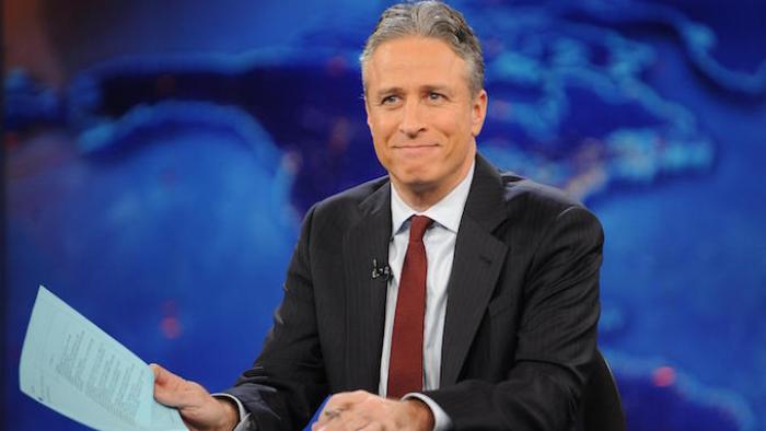 The Daily Show with Jon Stewart TV: Jon Stewart against a blue backdrop