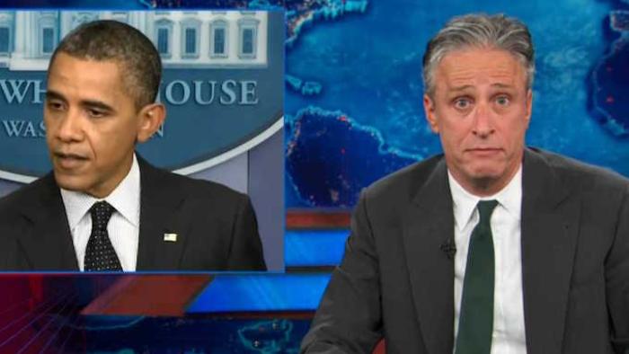 The Daily Show with Jon Stewart TV: Jon makes a funny face next to a split screen of Obama