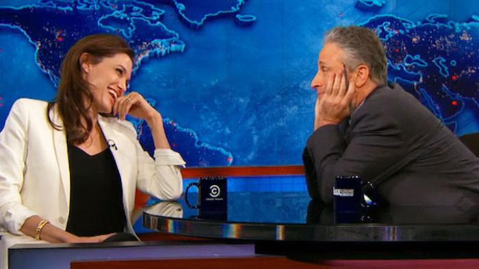 The Daily Show with Jon Stewart TV: Jon pretends to gaze lovingly at Angelina Jolie, who's laughing