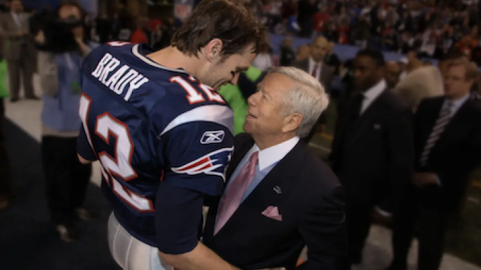 The Dynasty: New England Patriots screenshot 3: Tom Brady hugs Robert Kraft.