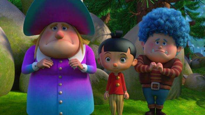Pinocchio and his friends stand in the woods, looking confused. 
