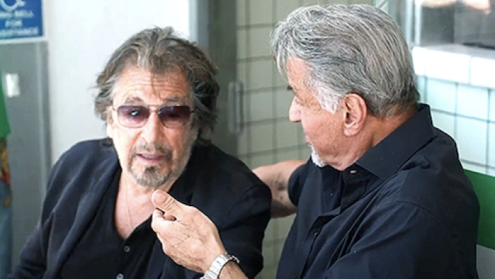 The Family Stallone screenshot 3: Al Pacino sitting and talking to Sylvestor Stallone