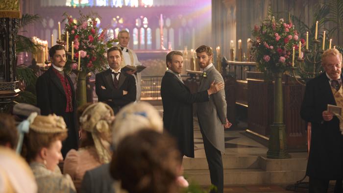 The Forsytes TV show screenshot 1: (L-R) Joshua Orpin, Jack Davenport, Stephen Moyer, and Danny Griffin. Moyer holds Griffin’s arms in his hand.