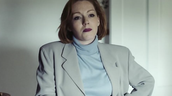 The Gold TV show screenshot 1: Nicki Jennings (Charlotte Spencer) stands with hand on hip.