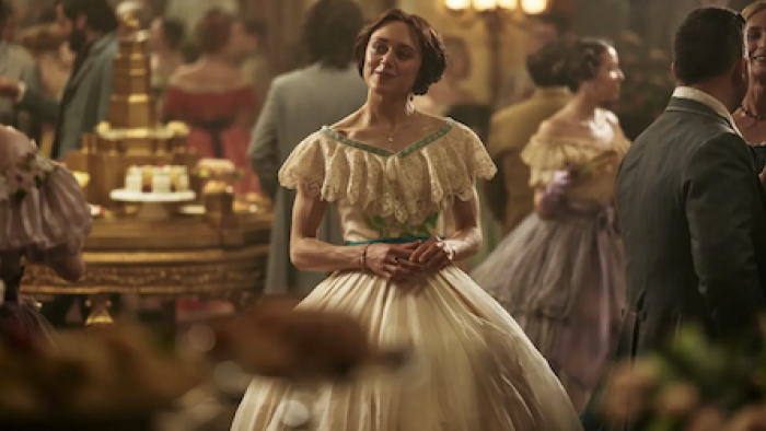 The Gray House TV show screenshot 1: Elizabeth Van Lewen in white dress at party. 