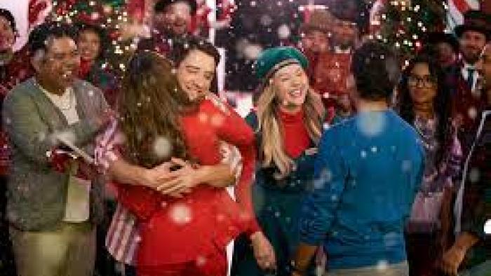 The Holiday Shift TV show Screenshot #1: People celebrate and hug