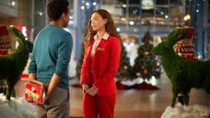 The Holiday Shift TV show Screenshot #2: a man and woman gaze at each other