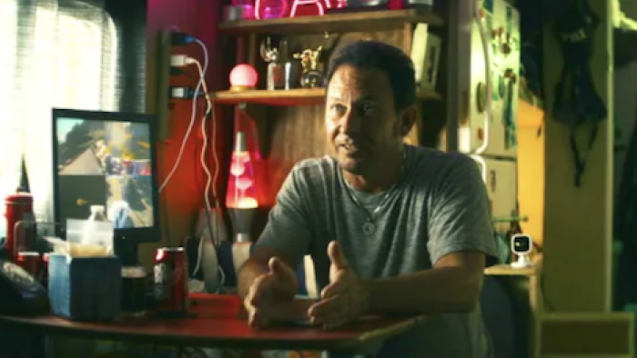 The Kings of Tupelo screenshot 1: Paul Kevin Curtis sits in his mobile home. 
