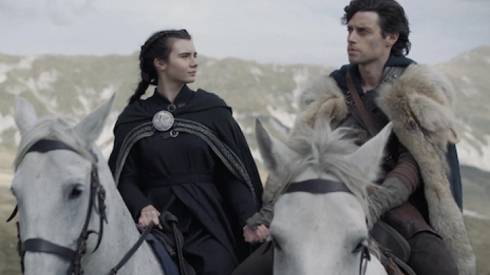 The Pendragon Cycle: Rise of the Merlin screenshot 3: Ganieda and Merlin in medieval attire on horses, facing each other in a mountainous landscape.