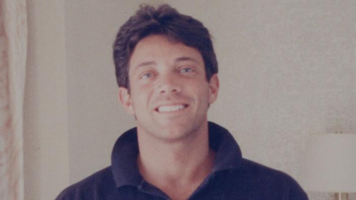 The Real Wolf of Wall Street TV show screenshot: Smiling close up of Jordan Belfort.