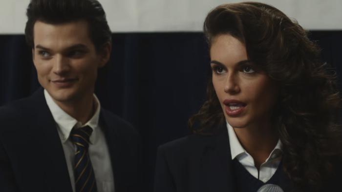 Homer Gere and Kaia Geber wear dark blue and white school uniforms.