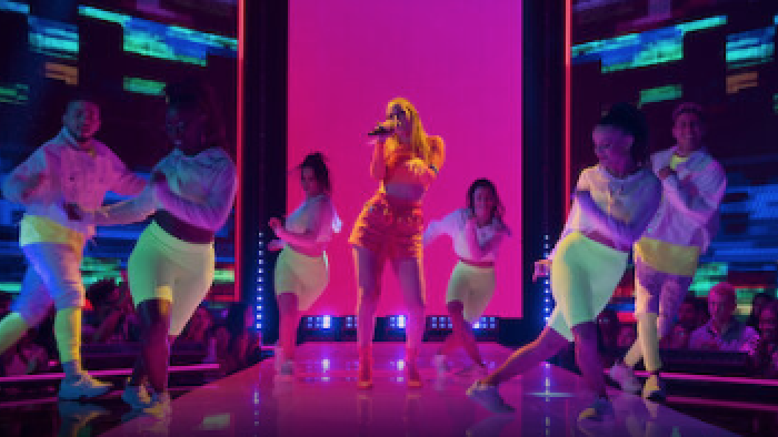 The Signing TV show: Female singer and dancers perform