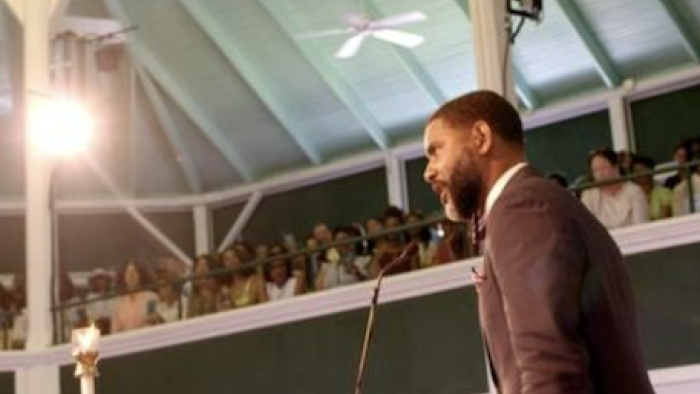 Preaching to a congregation. 