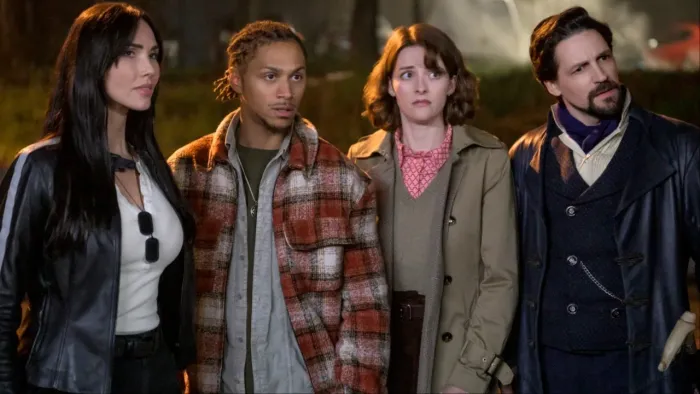 The Librarians The Next Chapter TV: Charlie, Connor, Lyra and Vikram stand side by side, looking off-camera to the right, confused.