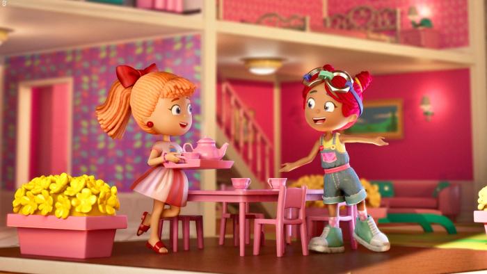 The Tinies TV: Inside a dollhouse, Bella carries a tray of tea to serve her sister Ollie who has an arm pointing to the table between them. 