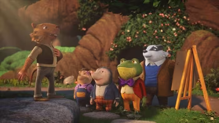 Toad & Friends TV screenshot 2: Ratty stands proudly on top of a rock, left hand to his chest. Hedge, Mole, Toad and Badger listen admiringly.
