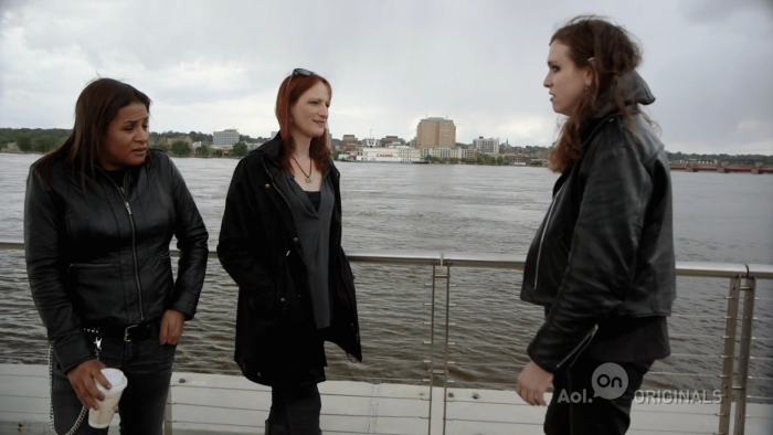 True Trans with Laura Jane Grace TV show: Grace speaks with two other people next to a body of water on an overcast day