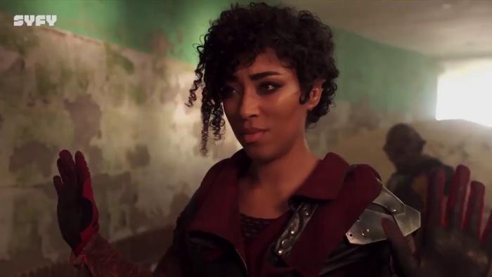 Vagrant Queen TV Show: Elida holds her hands up