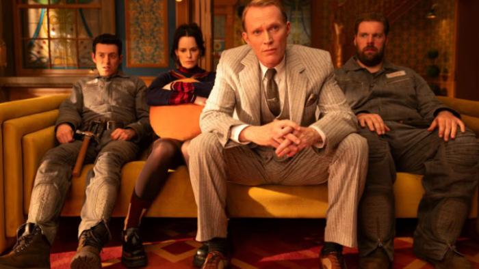 VisionQuest: Vision sits on a couch with his AI buddies DUM-E, U, and F.R.I.D.A.Y.; Vision sits up alertly as if waiting for an answer