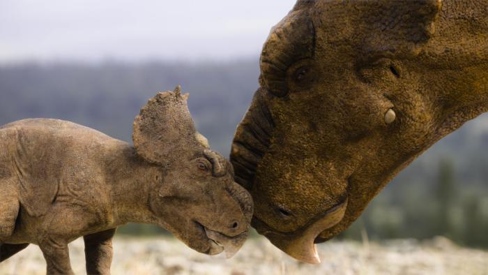 Walking with Dinosaurs TV Show screenshot 2: realistic baby triceratops nuzzles a larger dinosaur