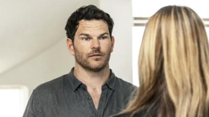 Watching You TV show screenshot 2: Josh Helman wears a dark grey buttoned shirt.