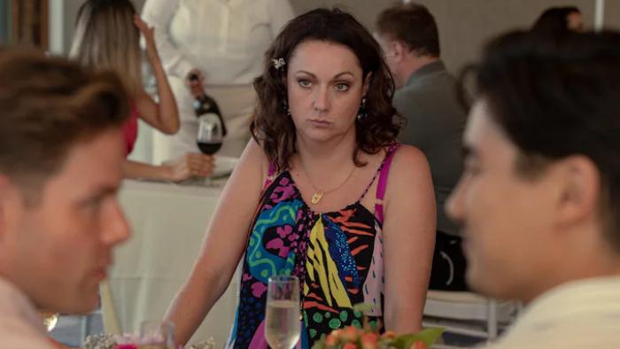 Wellmania TV show: Liv stands facing the camera in consternation as brother Gaz and fiance Dalbert appear to be arguing in the foreground