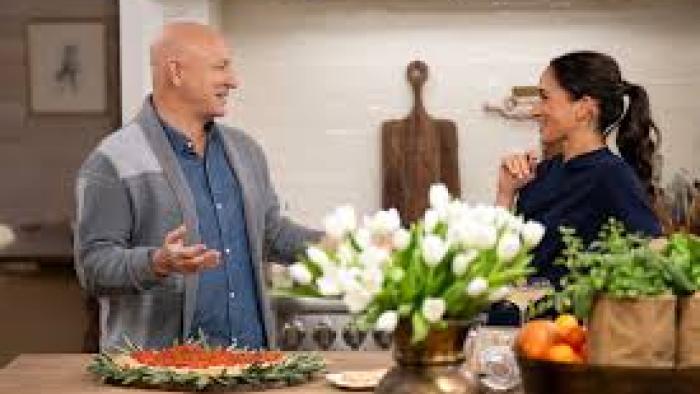 With Love, Meghan Holiday Celebration TV show screenshot #3: Meghan with Tom Colicchio in a kitchen 