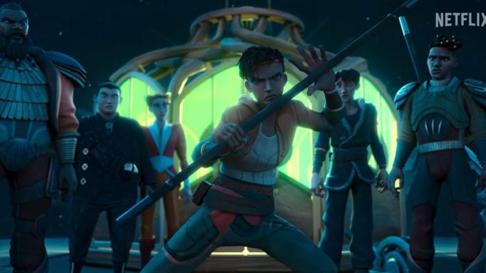Wolf King TV show: Whitley brandishes a bo stick with some of the other rebels behind her