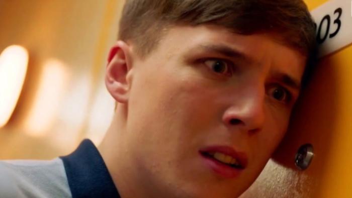 Wreck TV show: Jamie puts his ear to a cabin door as if listening in and has a distressed look on his face