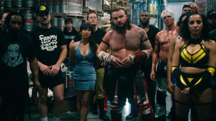 Wrestlers TV show screenshot 1: wrestlers gather backstage at OVW