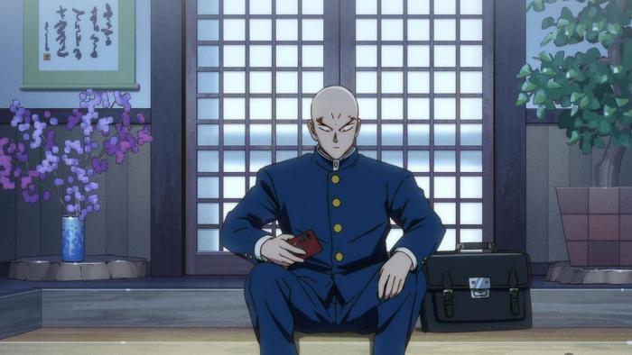 YAIBA: Samurai Legend TV Show: Takeshi sits on the ground as he checks his phone