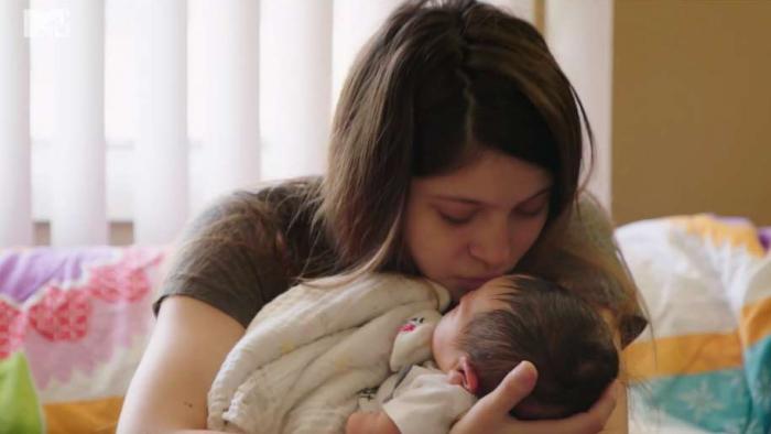 Teen Mom TV Series: Holding her newborn. 