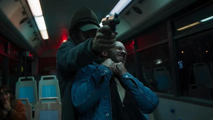 You Would Do It Too: a mysterious hooded man stops a robbery