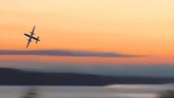 #Skyking movie: a plane flies in the sky during sunrise