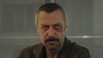 10 Days of a Curious Man Movie: A man looks unhappy or menacing