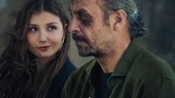 10 Days of a Curious Man Movie: Side profile of a man with a woman