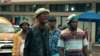 180 scene 1: Four men on a street, wearing casual hats and colorful clothes, with a van nearby.