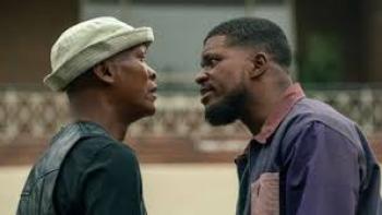 180 scene 3: Two men face off, appearing tense, outdoors.