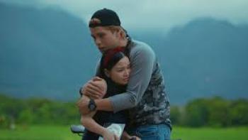 18th Rose: American young man and Filipina young woman embrace