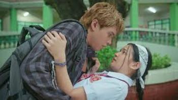 18th Rose: American young man and Filipina young woman embrace