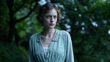 Lady Chatterley's Lover: Emma Corrin looking on in a forest