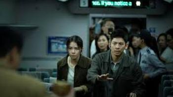96 Minutes Movie: Asian man and woman look tense