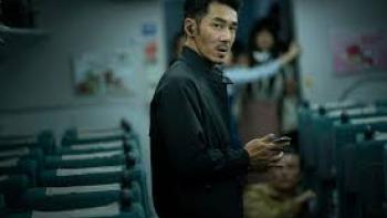 96 Minutes Movie: Asian man on train