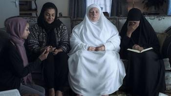 After Love: Joanna Scanlan's Mary grieving the death of her husband with the women of her Muslim community.