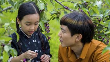 After Yang Movie: Malea Emma Tjandrawidjaja and Justin H. Min look at a tree