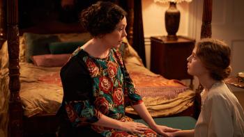 Mothering Sunday: Odessa Young and Olivia Colman sitting on a bed