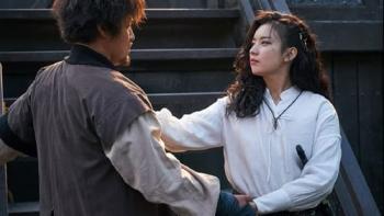 A man and woman talking.