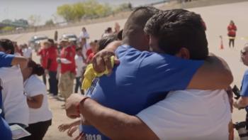 A 3 Minute Hug Movie: Two men embrace