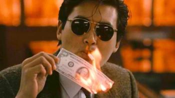 A Better Tomorrow: Chow Yun-Fat lights a cigarette with a burning 100 dollar bill