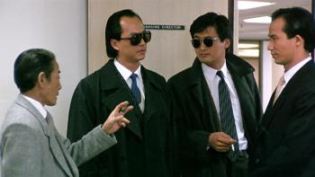 A Better Tomorrow: A group of Chinese gangsters in suits